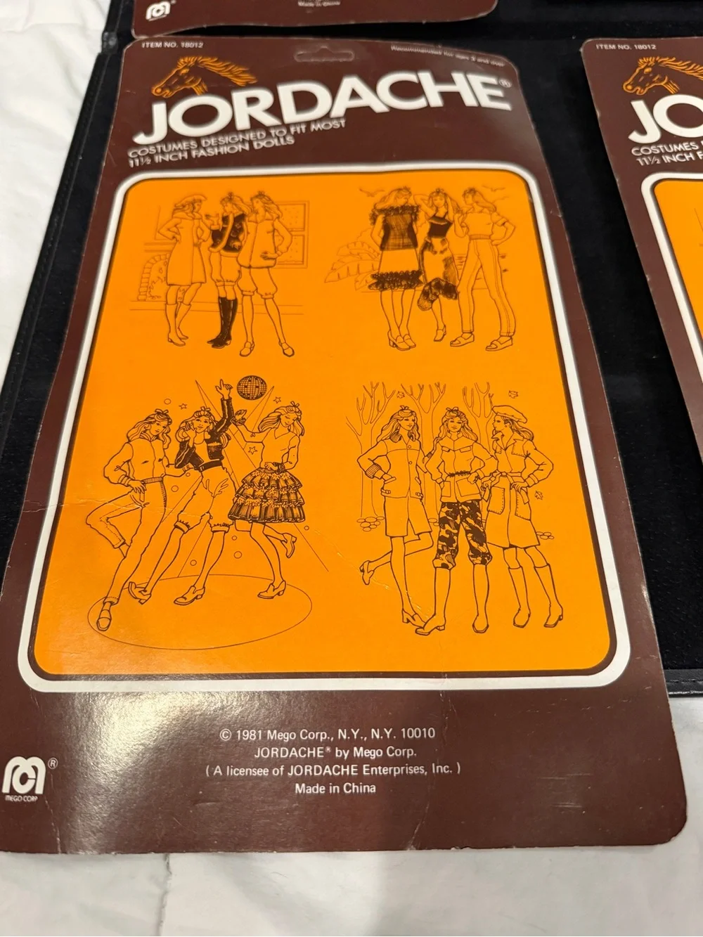 Vintage 70’s/80’s Jordache Pack of Four Doll Outfits in Pink, Black, Red, Yellow